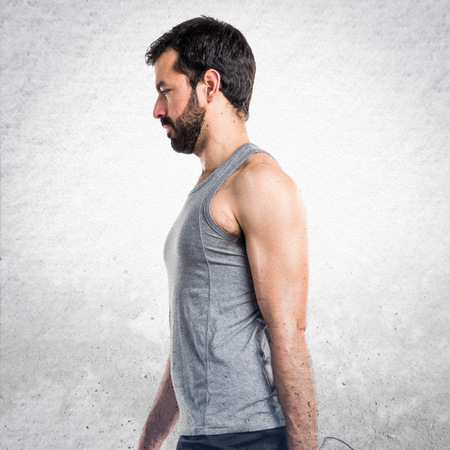 Sportman stretching legsの写真素材