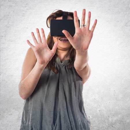 Young girl using VR glasses