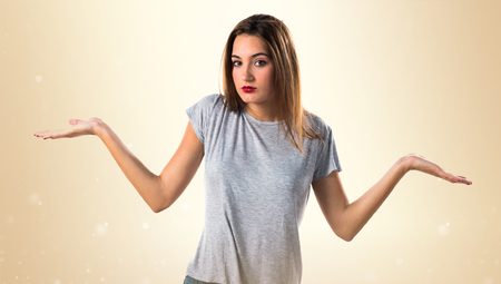 Young girl making unimportant gestureの写真素材