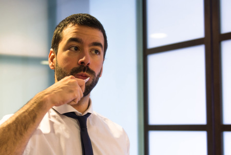 Man brushing her teethの写真素材