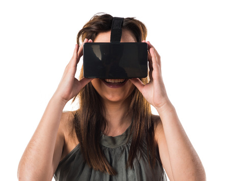 Young girl using VR glassesの写真素材