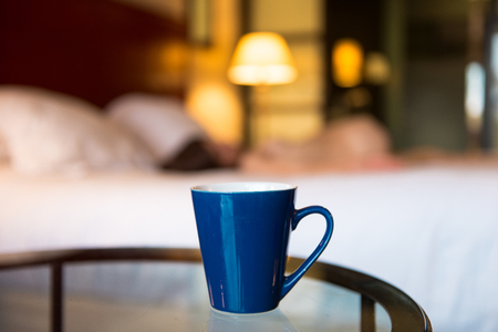 Naked woman and coffe in luxury hotelの写真素材