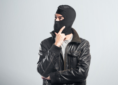 Robber thinkingの写真素材