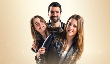 Three friends with black leatherの写真素材