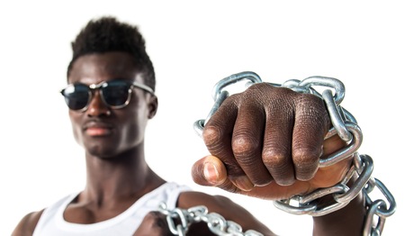 Handsome man with sunglasses and chains