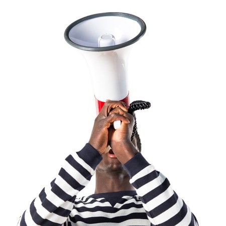Black man shouting by megaphoneの写真素材
