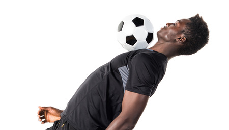 Black man playing footballの写真素材