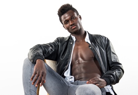 Handsome black man with leather jacketの写真素材