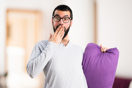 Man in pajamas doing surprise gestureの写真素材