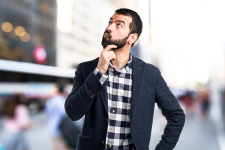 Handsome man thinkingの写真素材