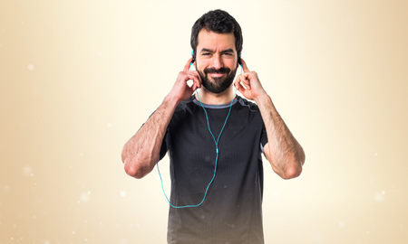 Sportman listening musicの写真素材