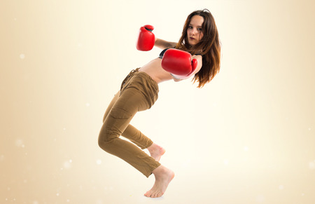 Girl with boxing glovesの写真素材