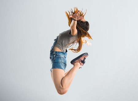 Young woman jumpingの写真素材