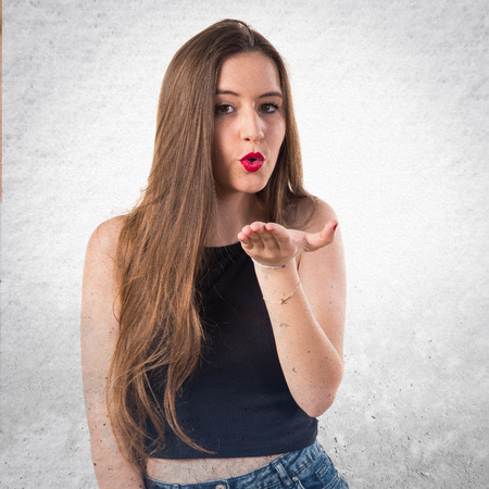 Woman sending a kissの写真素材