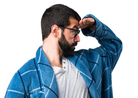 Man in dressing gown showing somethingの写真素材