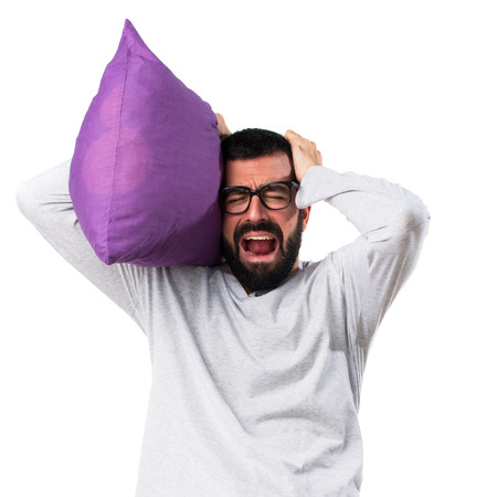frustrated man in pajamasの写真素材