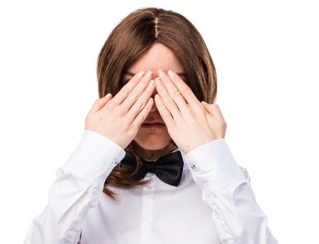 Waitress covering her eyesの写真素材