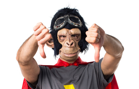 Superhero monkey man doing bad signalの写真素材