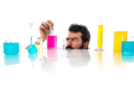 Crazy scientist man with skullの写真素材