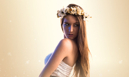 Model woman with crown of flowersの写真素材