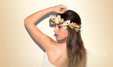 Model woman with crown of flowersの写真素材