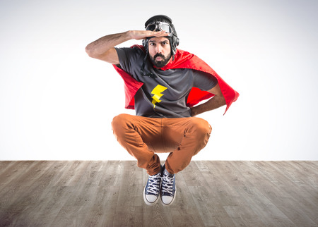 Superhero showing somethingの写真素材