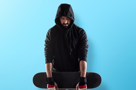 Man with his skateの写真素材