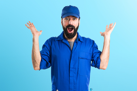 Plumber doing surprise gestureの写真素材