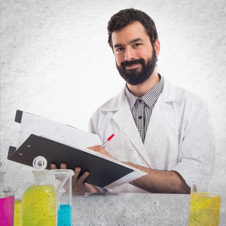 Scientist man with his notebookの写真素材