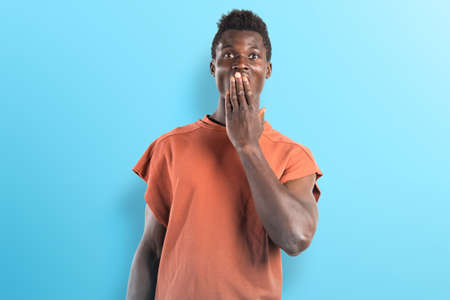 Handsome black man doing surprise gestureの写真素材