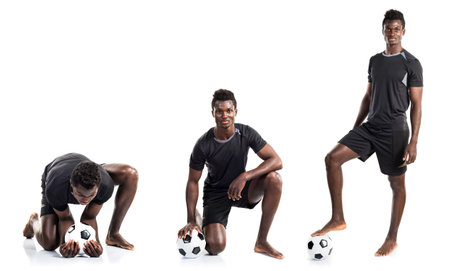 Black man playing footballの写真素材
