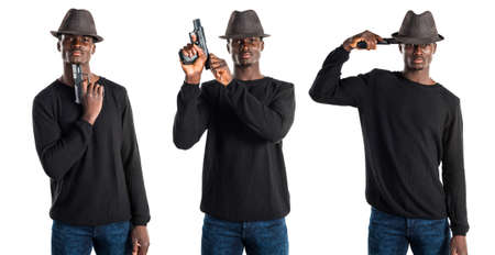 Black man holding a pistolの写真素材