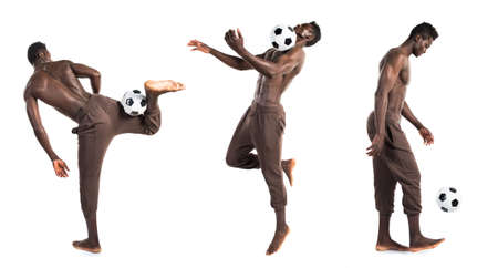 Black man playing footballの写真素材