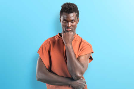 Handsome black man thinkingの写真素材