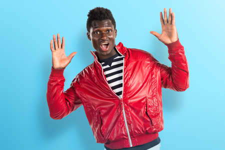 Handsome black man doing surprise gestureの写真素材