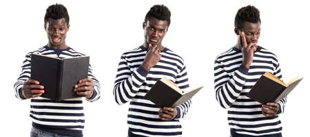 Handsome black man reading bookの写真素材