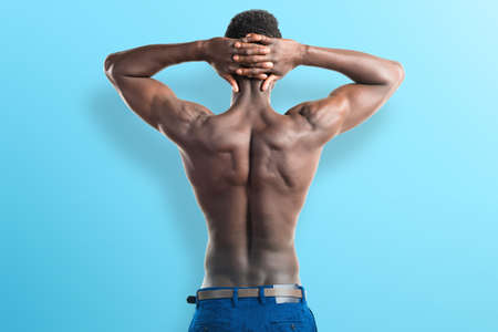 Handsome black man with athletic body posingの写真素材