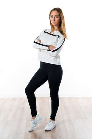 Blonde teen girl posing in studioの写真素材