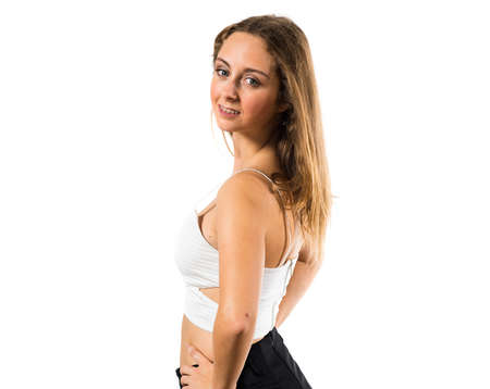 Blonde teen girl posing in studioの写真素材