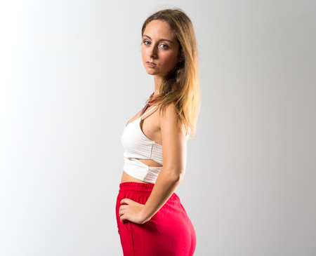 Blonde teen girl posing in studioの写真素材