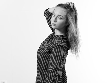 Blonde teen girl posing in studioの写真素材