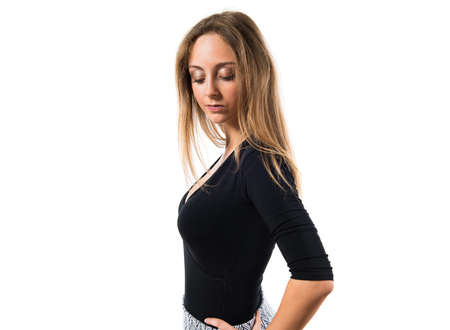 Blonde teen girl posing in studioの写真素材