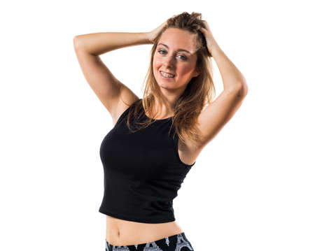 Blonde teen girl posing in studioの写真素材
