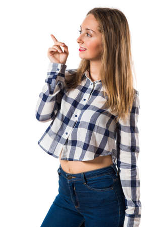 Blonde teen girl pointing upの写真素材