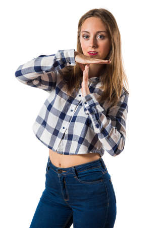Blonde teen girl making time out gestureの写真素材