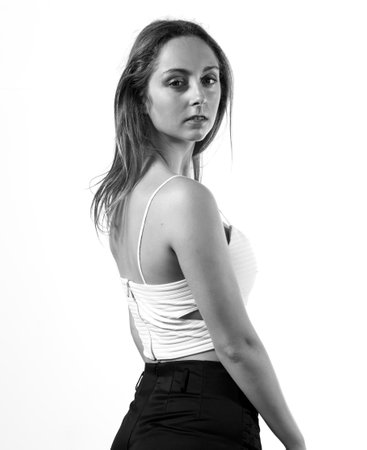 Blonde teen girl posing in studioの写真素材