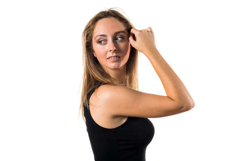 Blonde teen girl posing in studioの写真素材