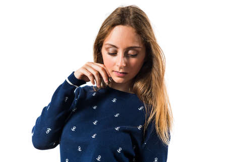 Blonde teen girl posing in studioの写真素材