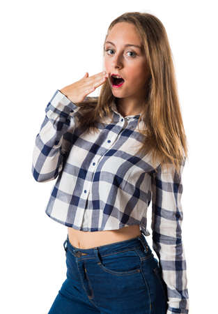 Blonde teen girl yawningの写真素材