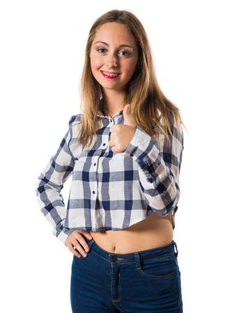 Blonde teen girl with thumb upの写真素材